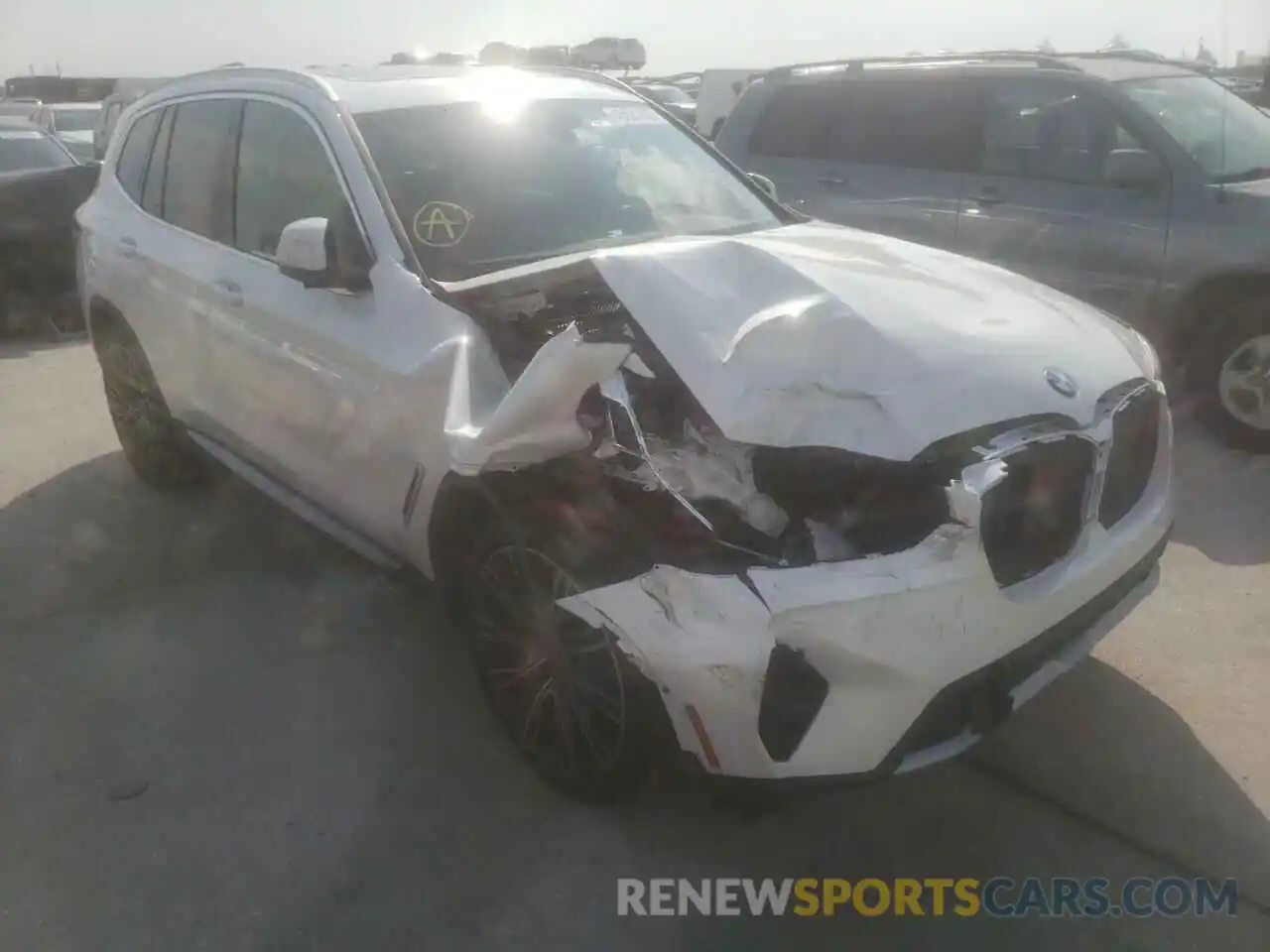 1 Photograph of a damaged car 5UX43DP04N9L27332 BMW X3 2022