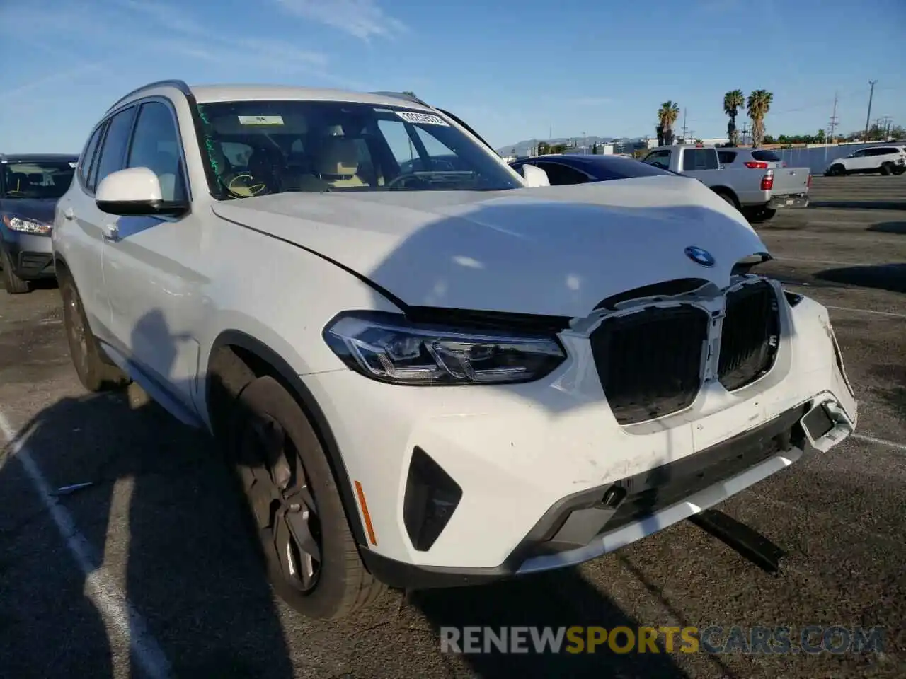 1 Photograph of a damaged car 5UX43DP05N9J50452 BMW X3 2022