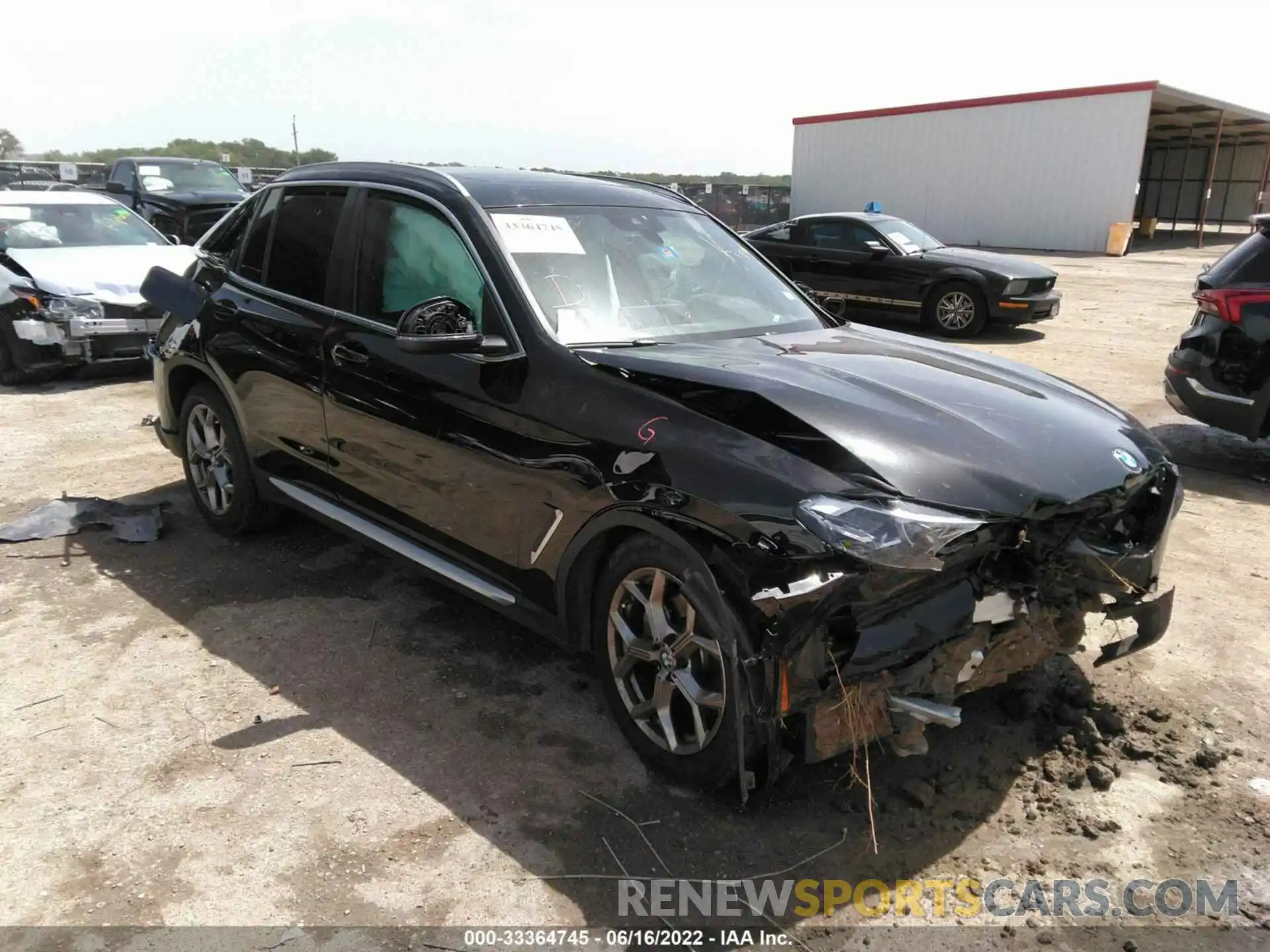 1 Photograph of a damaged car 5UX43DP06N9J24510 BMW X3 2022