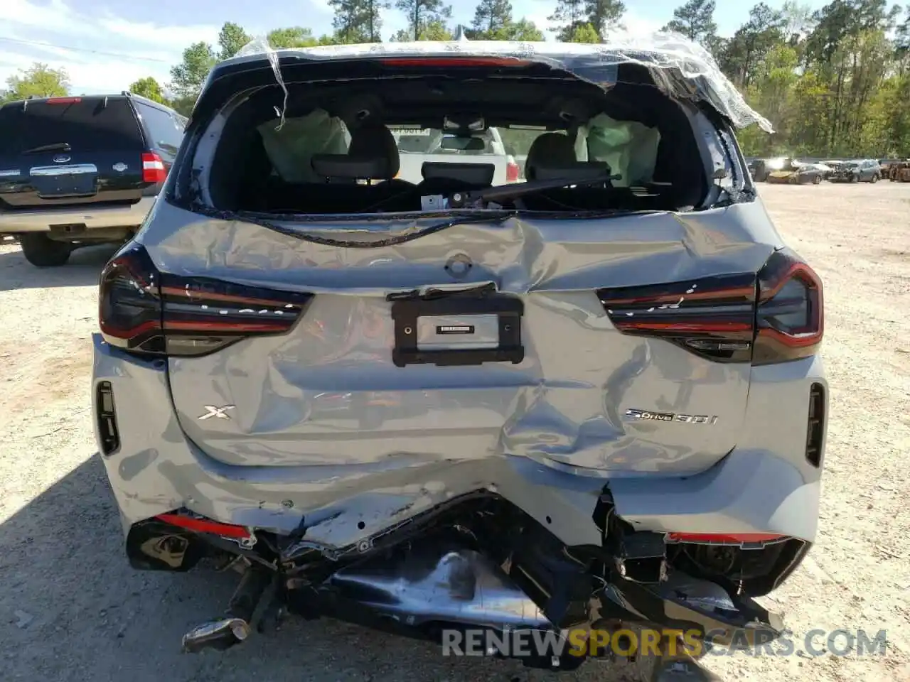 9 Photograph of a damaged car 5UX43DP07N9K95752 BMW X3 2022