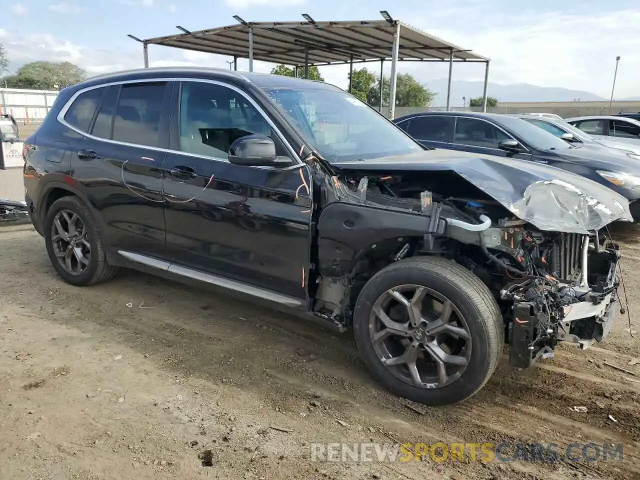 4 Photograph of a damaged car 5UX43DP08N9M44069 BMW X3 2022