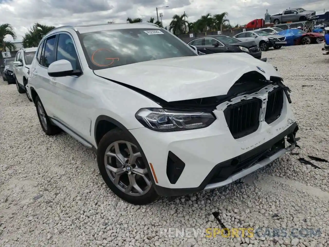 1 Photograph of a damaged car 5UX43DP0XN9J34991 BMW X3 2022