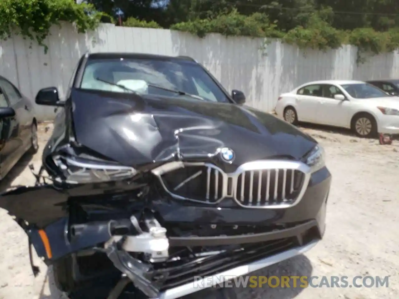 9 Photograph of a damaged car 5UX43DP0XN9L39758 BMW X3 2022