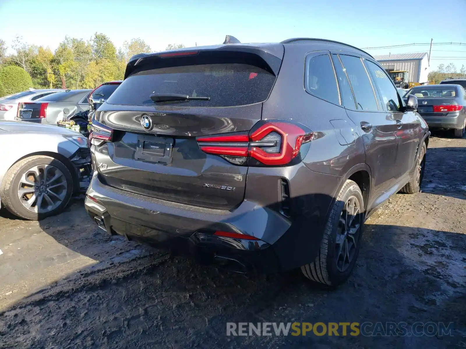 4 Photograph of a damaged car 5UX53DP00N9J01731 BMW X3 2022