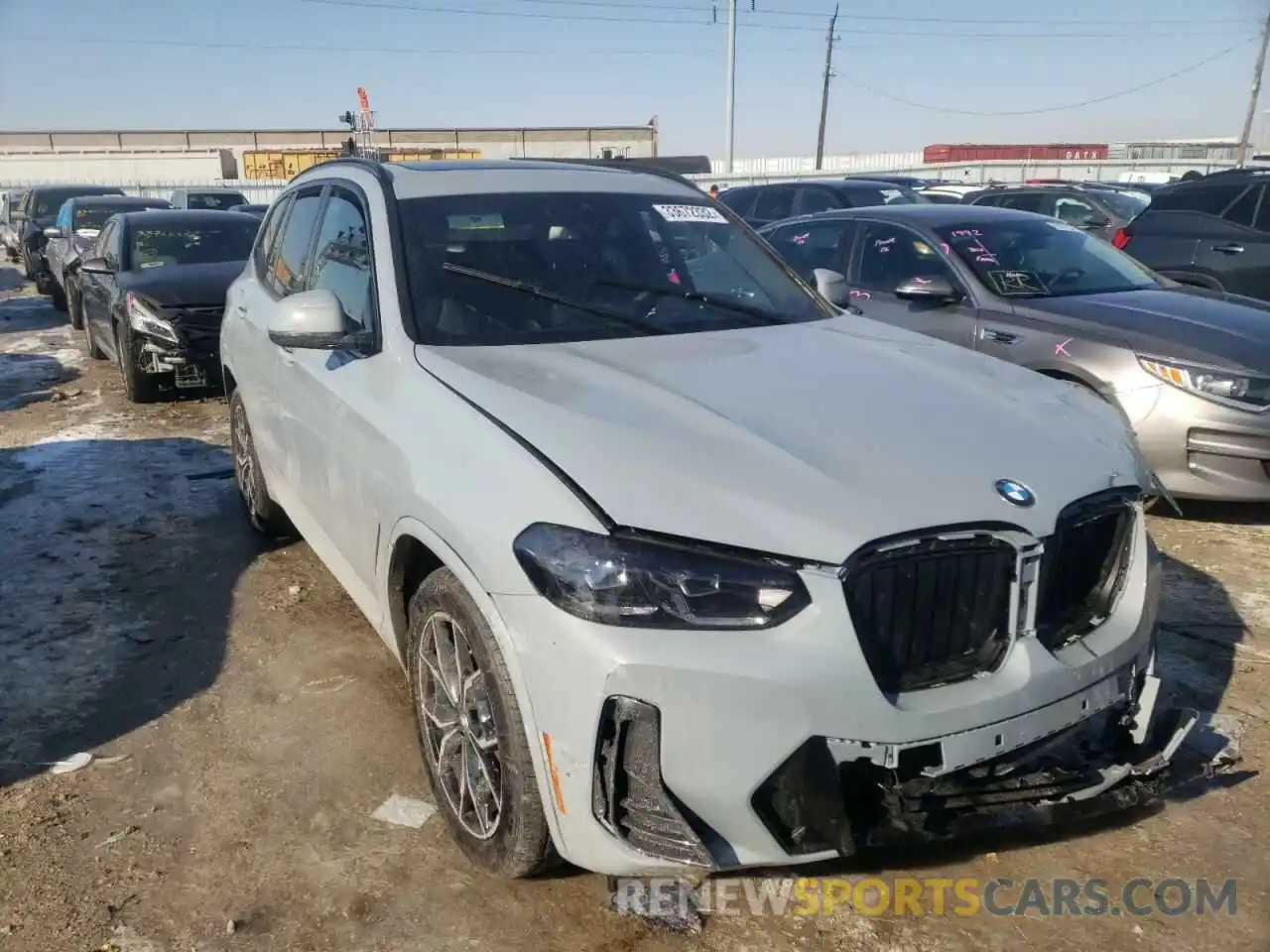 1 Photograph of a damaged car 5UX53DP01N9J31952 BMW X3 2022