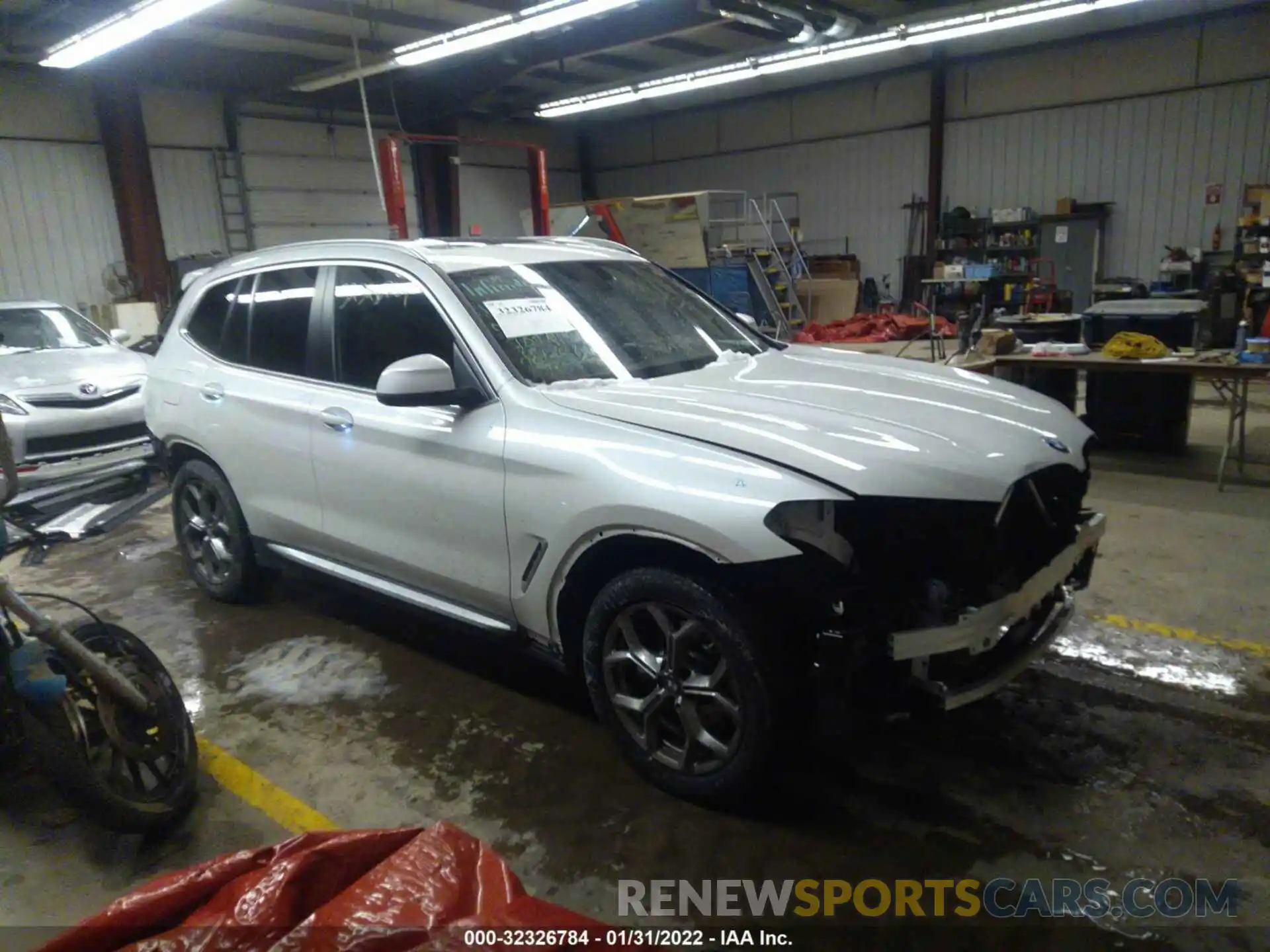 1 Photograph of a damaged car 5UX53DP02N9J20930 BMW X3 2022