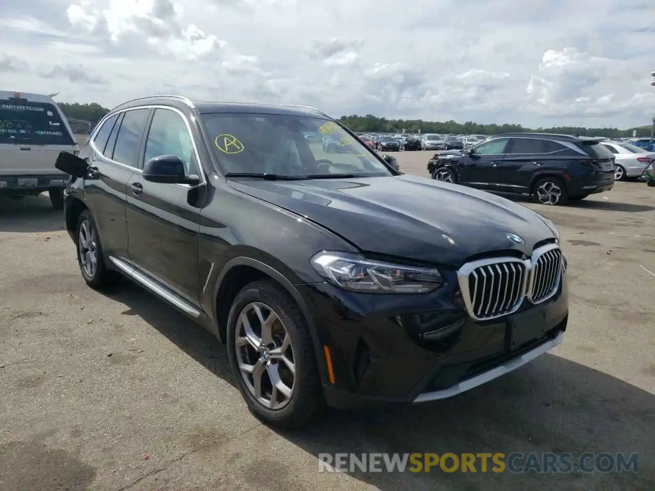 1 Photograph of a damaged car 5UX53DP02N9L12977 BMW X3 2022