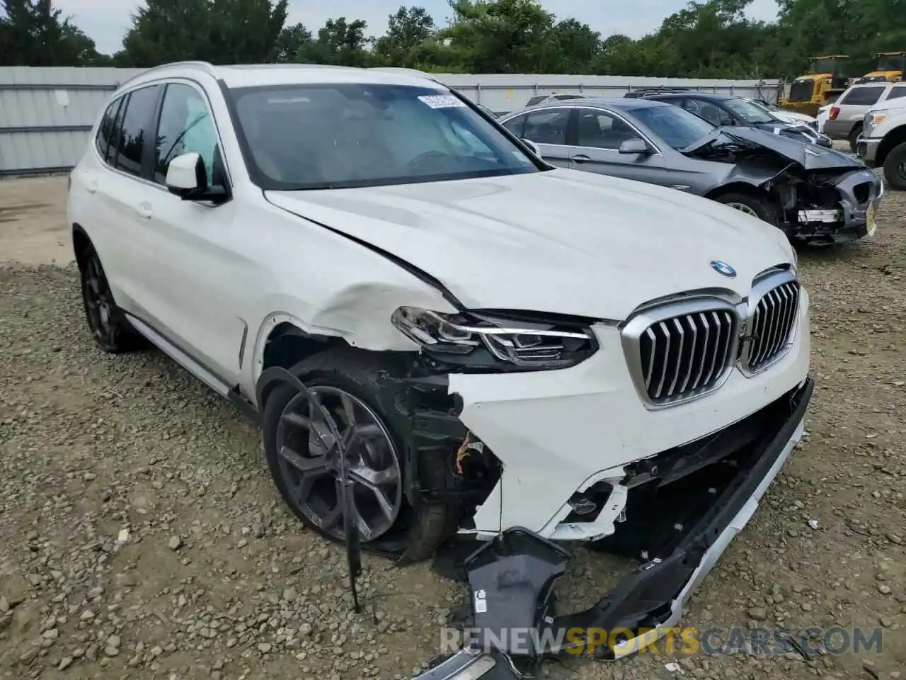 1 Photograph of a damaged car 5UX53DP02N9L63069 BMW X3 2022