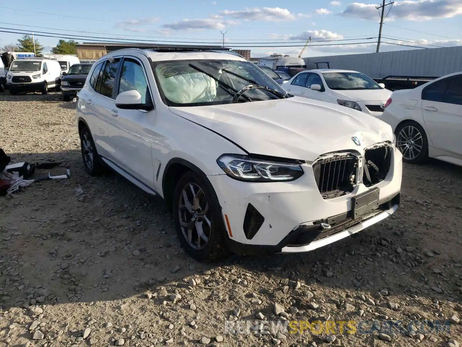 1 Photograph of a damaged car 5UX53DP03N9J01870 BMW X3 2022