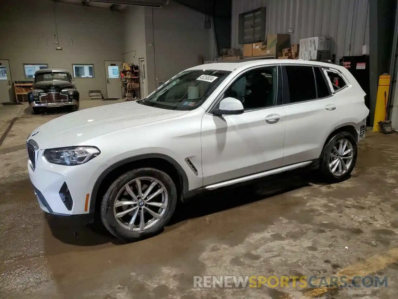 1 Photograph of a damaged car 5UX53DP04N9K82073 BMW X3 2022