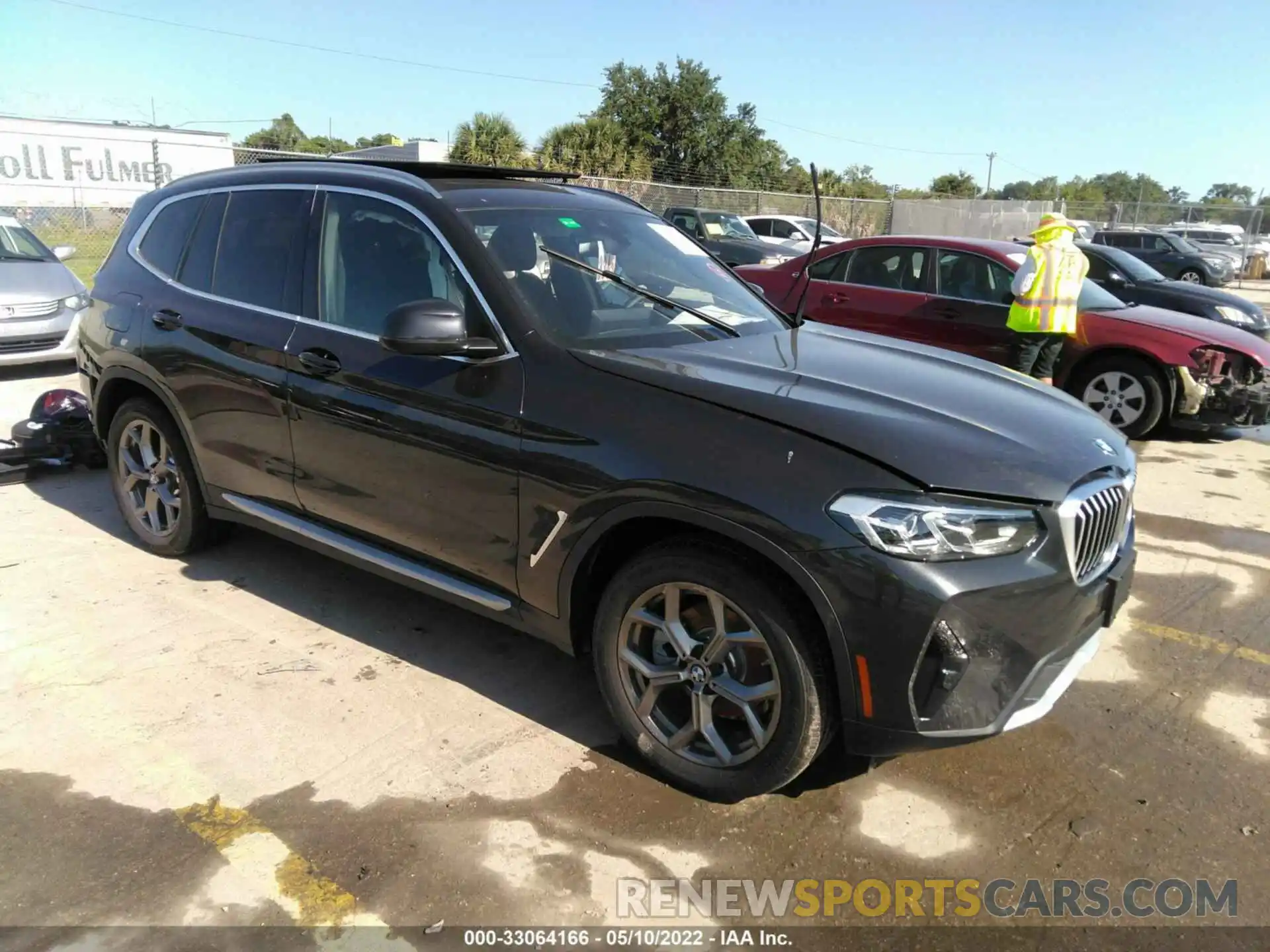 1 Photograph of a damaged car 5UX53DP04N9L73165 BMW X3 2022