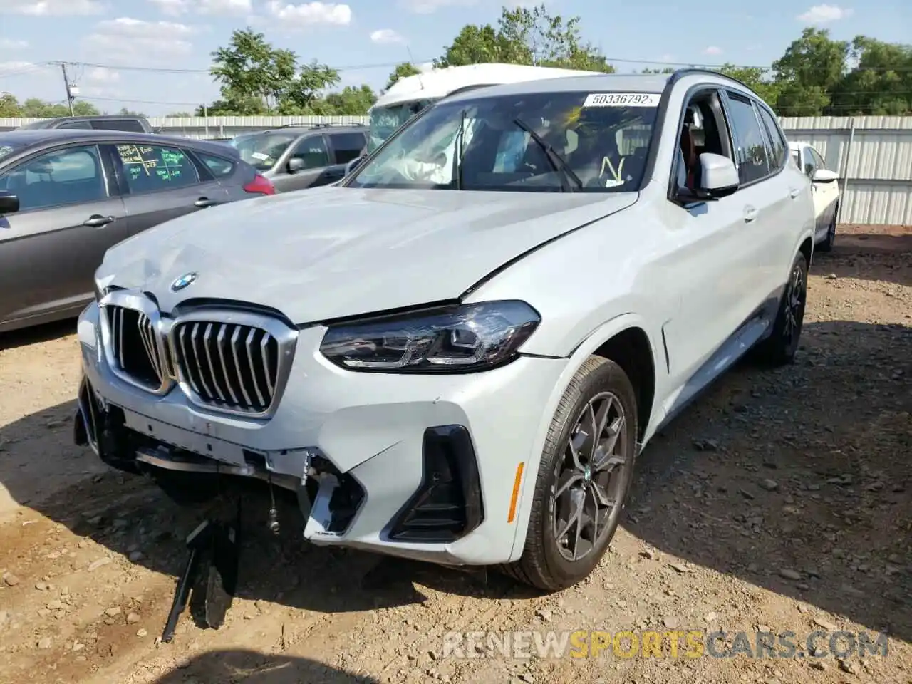 2 Photograph of a damaged car 5UX53DP05N9M75770 BMW X3 2022