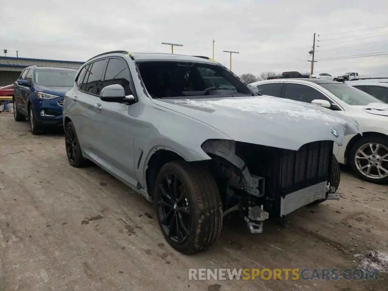 1 Photograph of a damaged car 5UX53DP08N9J66892 BMW X3 2022