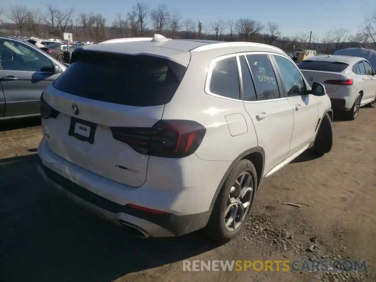 4 Photograph of a damaged car 5UX53DP08N9K59248 BMW X3 2022