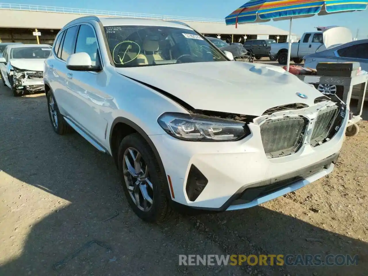 1 Photograph of a damaged car 5UX53DP08N9L24468 BMW X3 2022