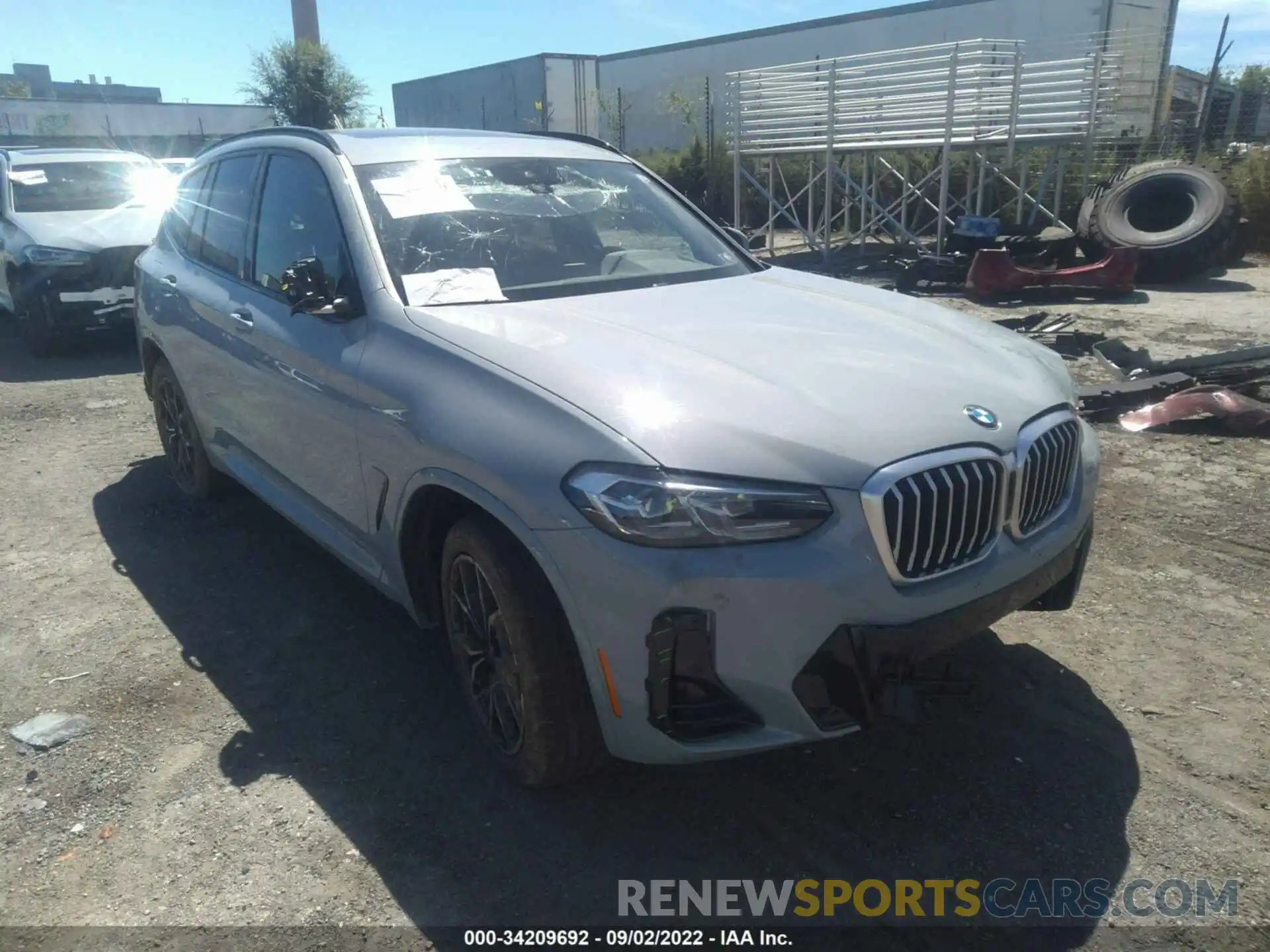 1 Photograph of a damaged car 5UX53DP08N9L35745 BMW X3 2022