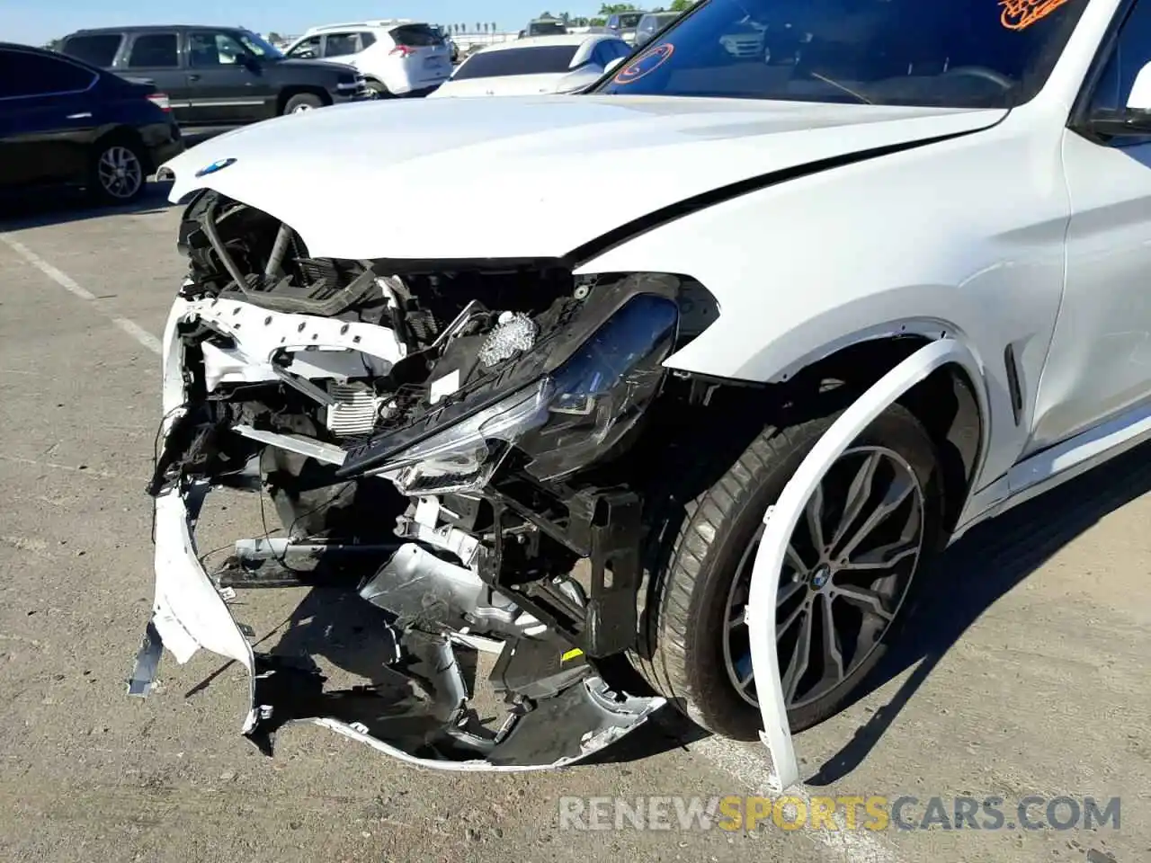 9 Photograph of a damaged car 5UX53DP09N9K84207 BMW X3 2022