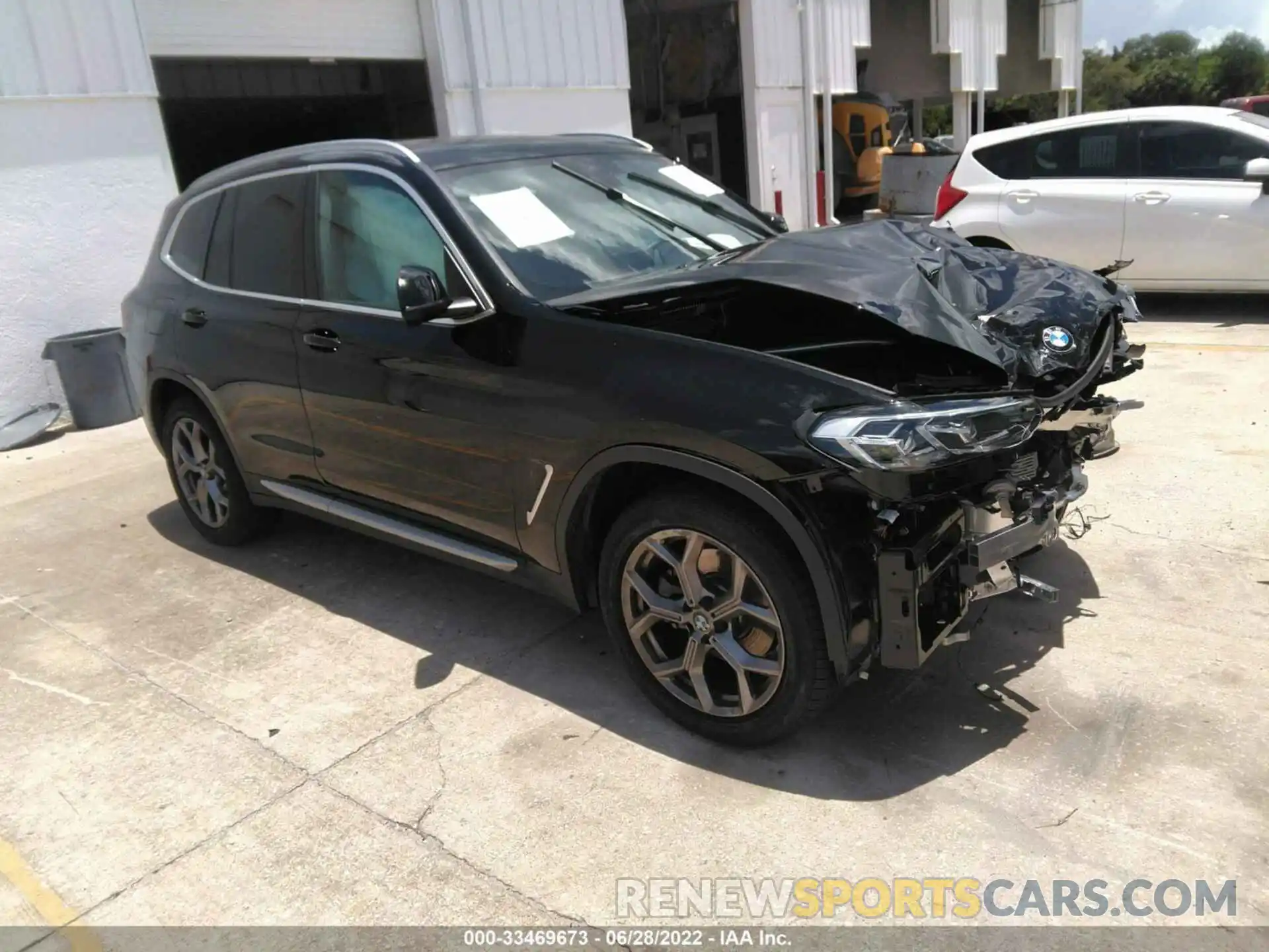 1 Photograph of a damaged car 5UX53DP09N9L36127 BMW X3 2022