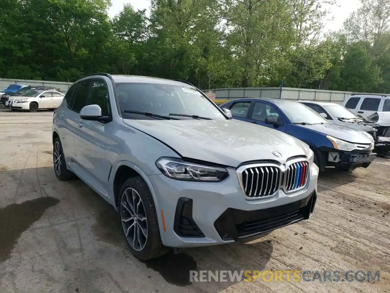 1 Photograph of a damaged car 5UX53DP0XN9K21049 BMW X3 2022