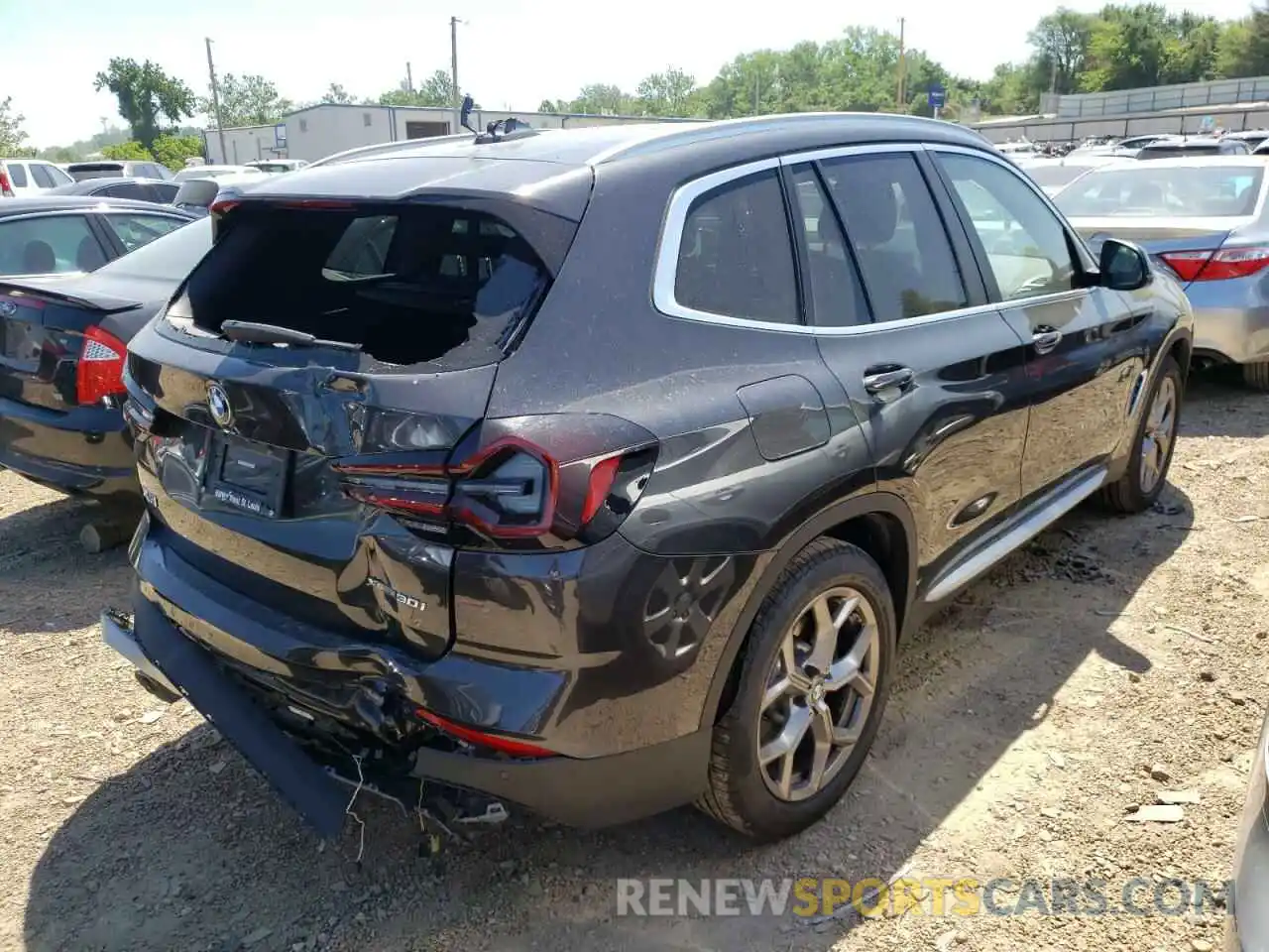 4 Photograph of a damaged car 5UX53DP0XN9K45822 BMW X3 2022