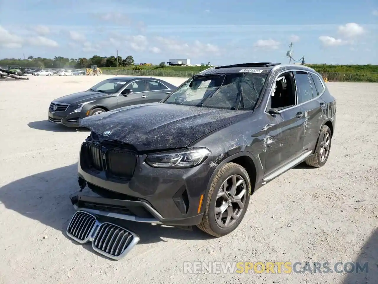 9 Photograph of a damaged car 5UX53DP0XN9K84605 BMW X3 2022