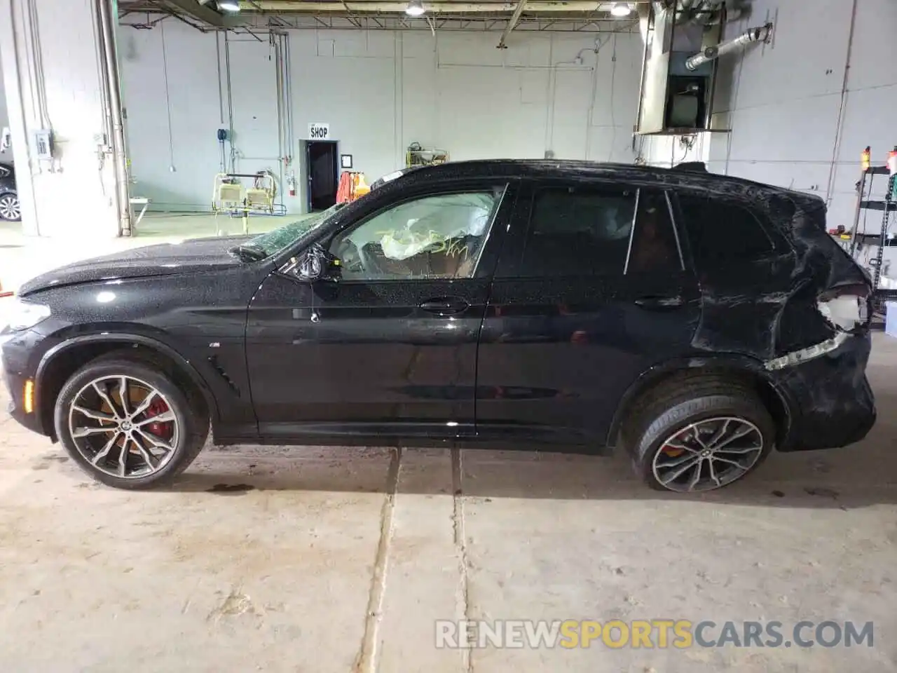 9 Photograph of a damaged car 5UX83DP03N9L35584 BMW X3 2022