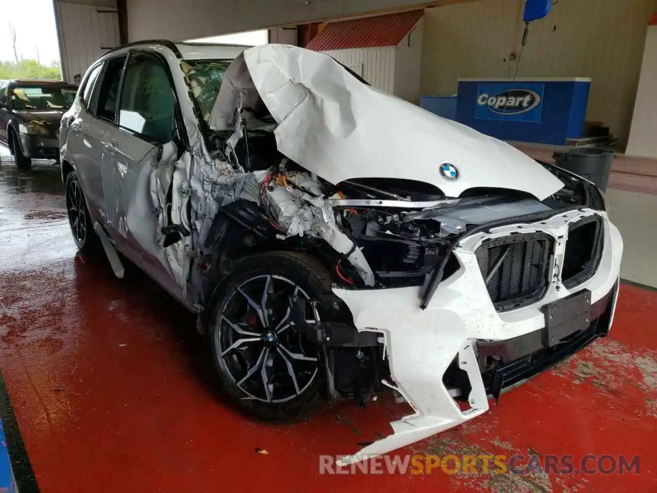 1 Photograph of a damaged car 5UX83DP04N9J11370 BMW X3 2022