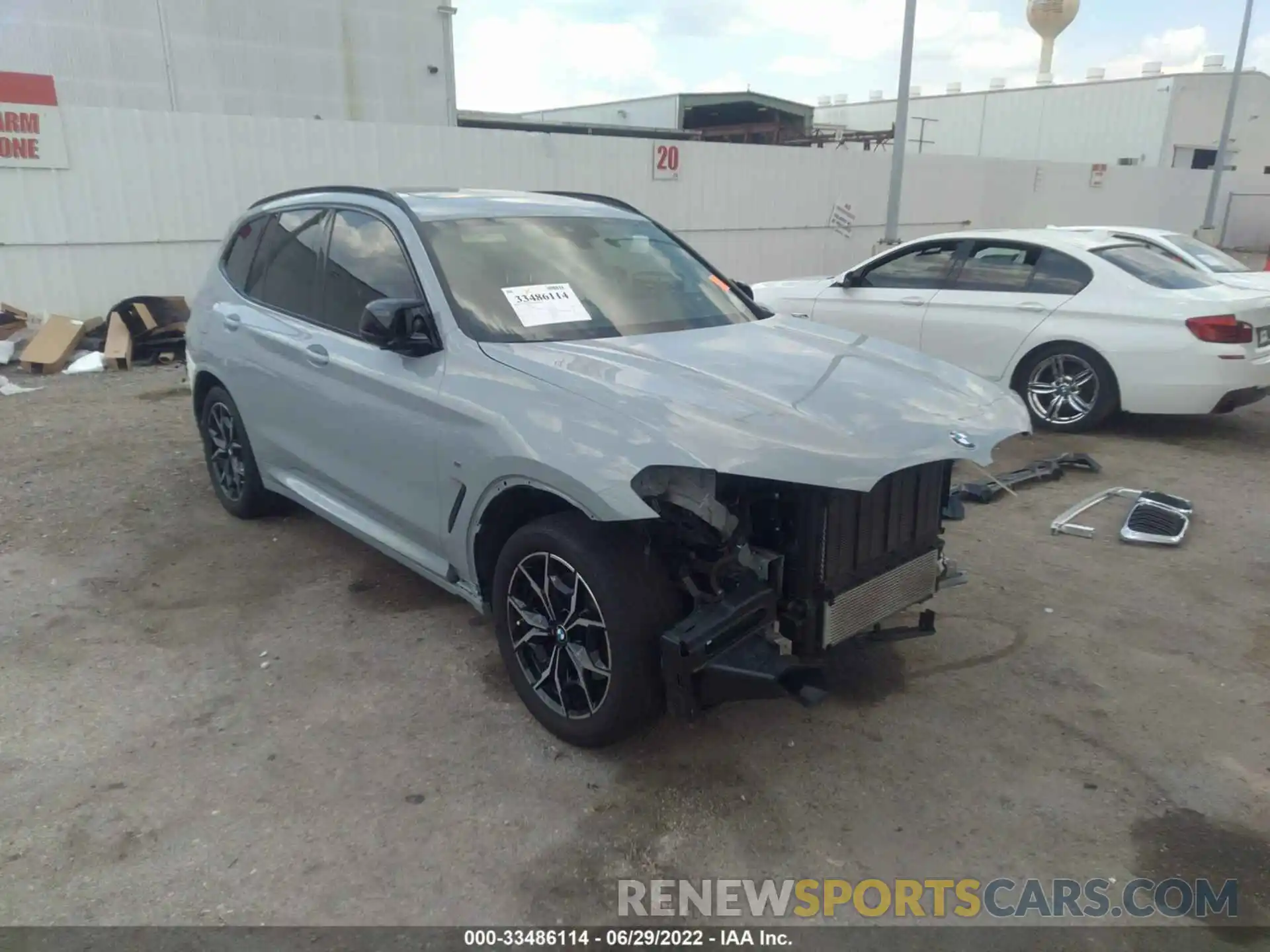 1 Photograph of a damaged car 5UX83DP06N9J24881 BMW X3 2022