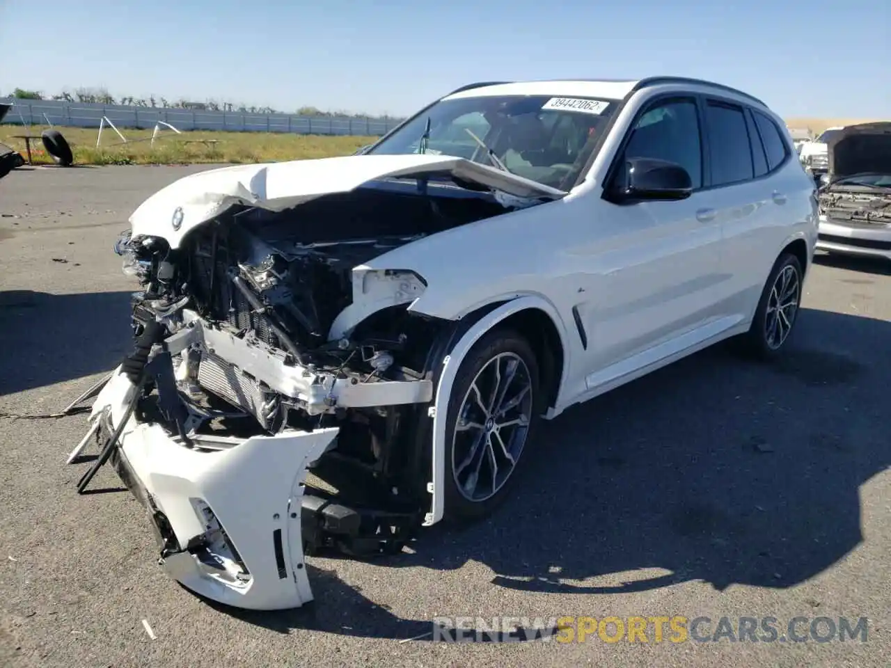 2 Photograph of a damaged car 5UX83DP07N9J20094 BMW X3 2022