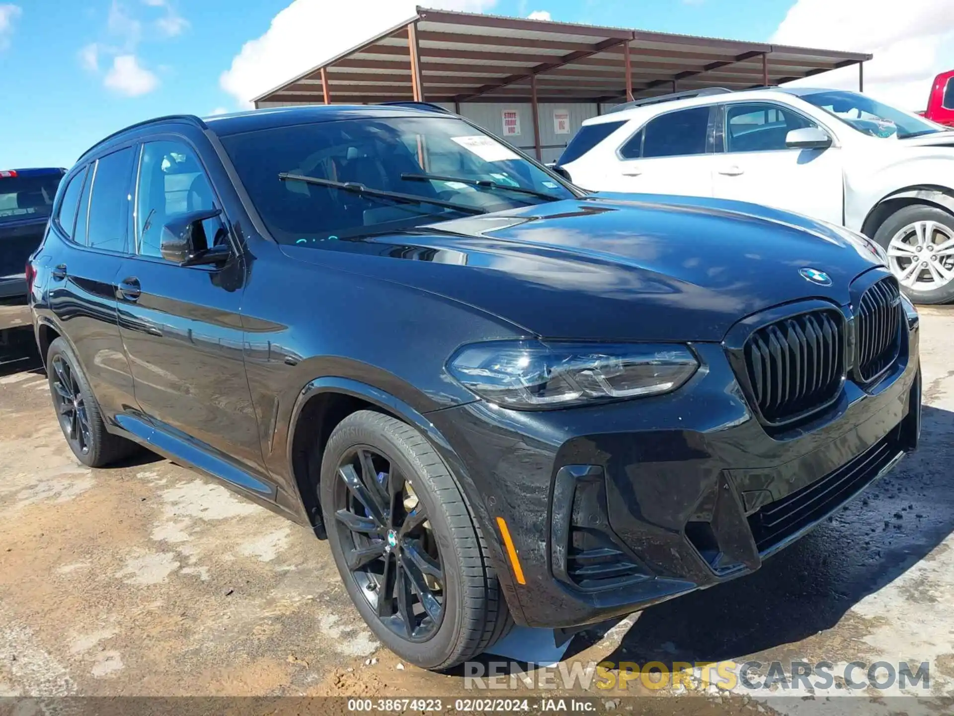 1 Photograph of a damaged car 5UX83DP07N9N01055 BMW X3 2022