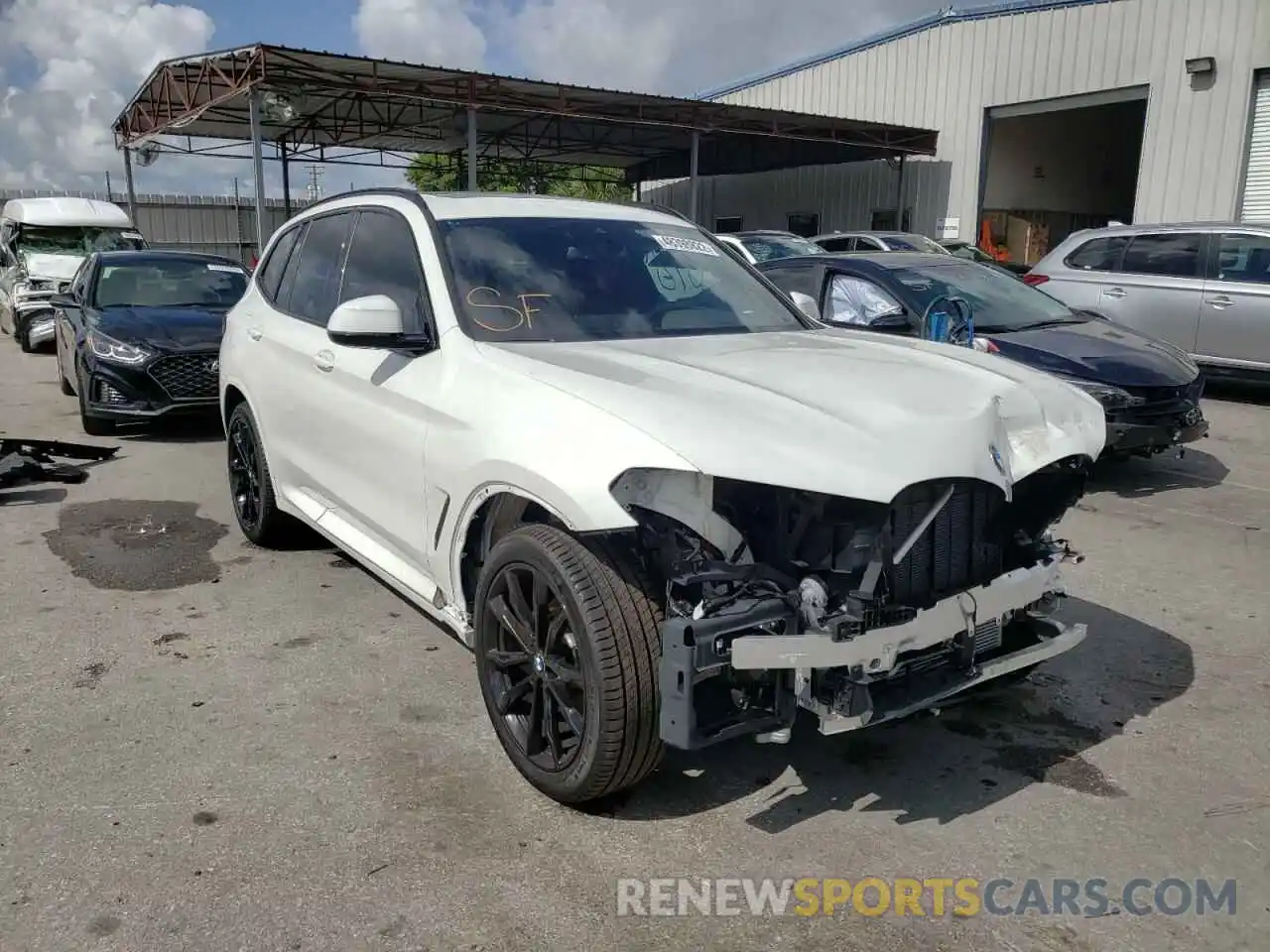 1 Photograph of a damaged car WBX47DP04NN126806 BMW X3 2022