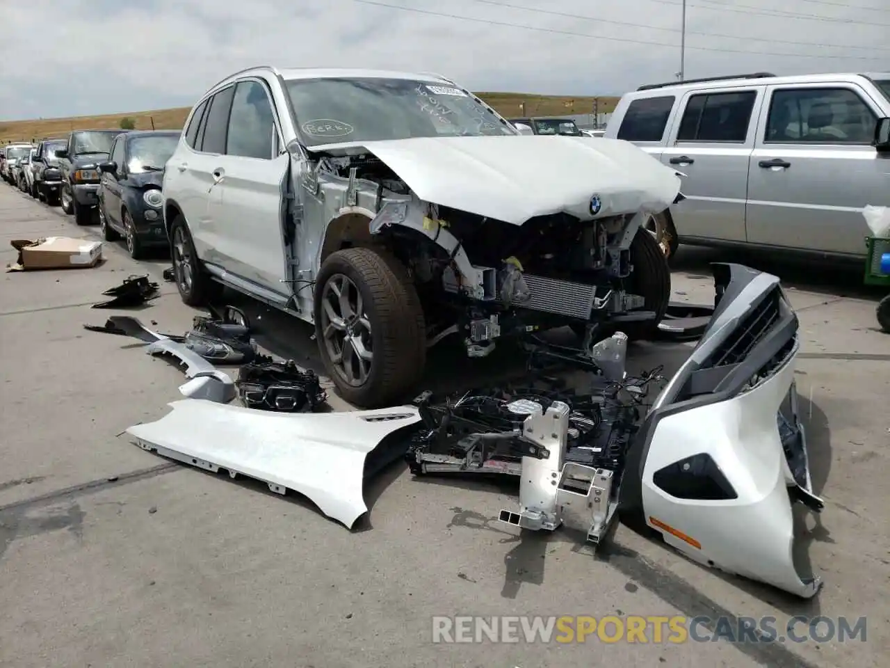 1 Photograph of a damaged car WBX57DP02NN148047 BMW X3 2022