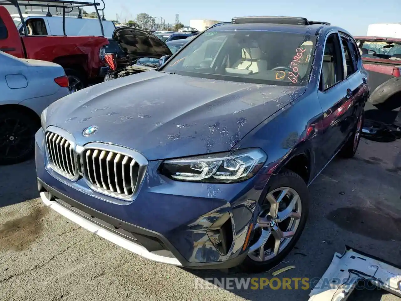 2 Photograph of a damaged car WBX57DP04NN143139 BMW X3 2022