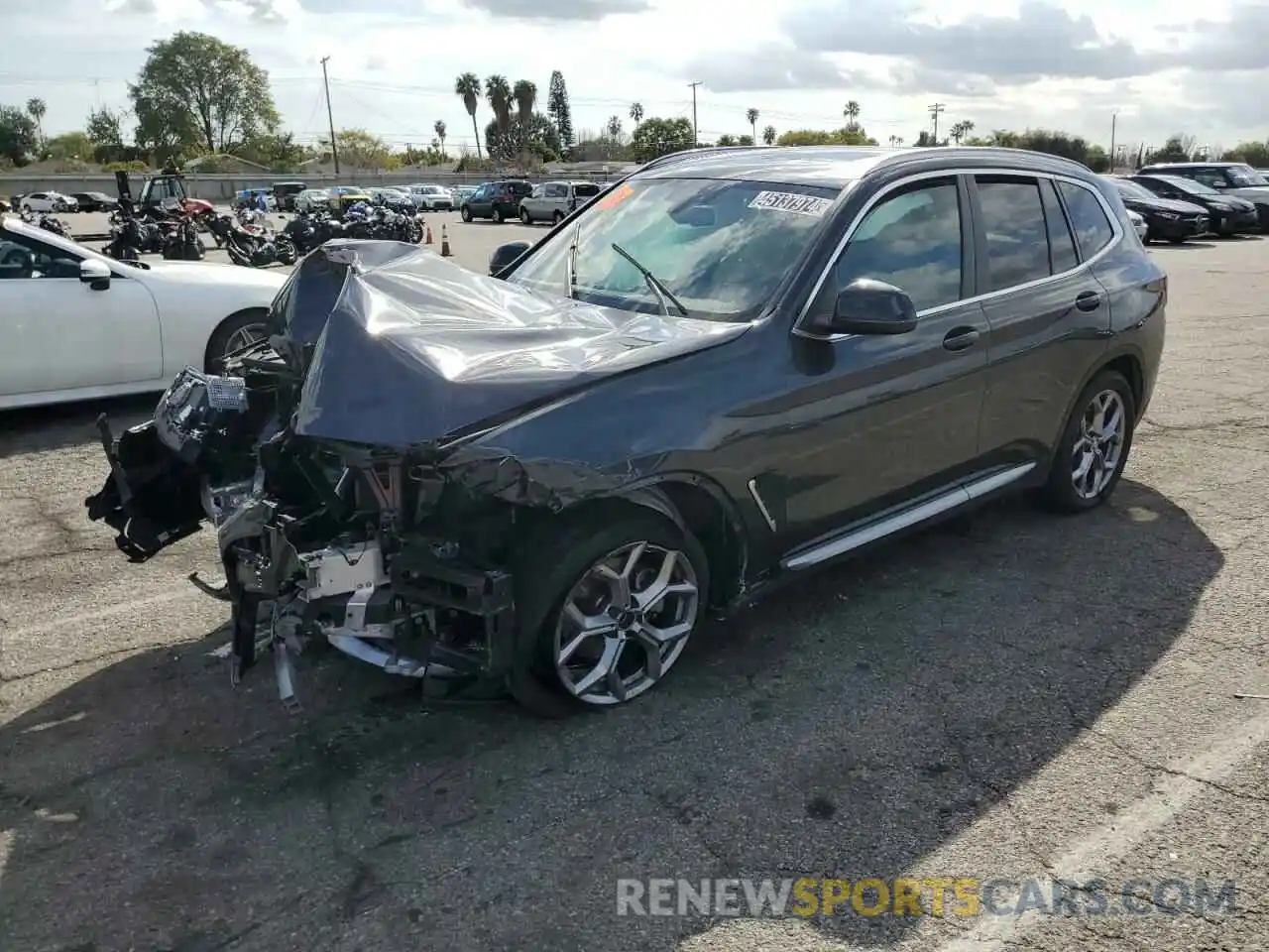 1 Photograph of a damaged car 5UX43DP01P9R40785 BMW X3 2023