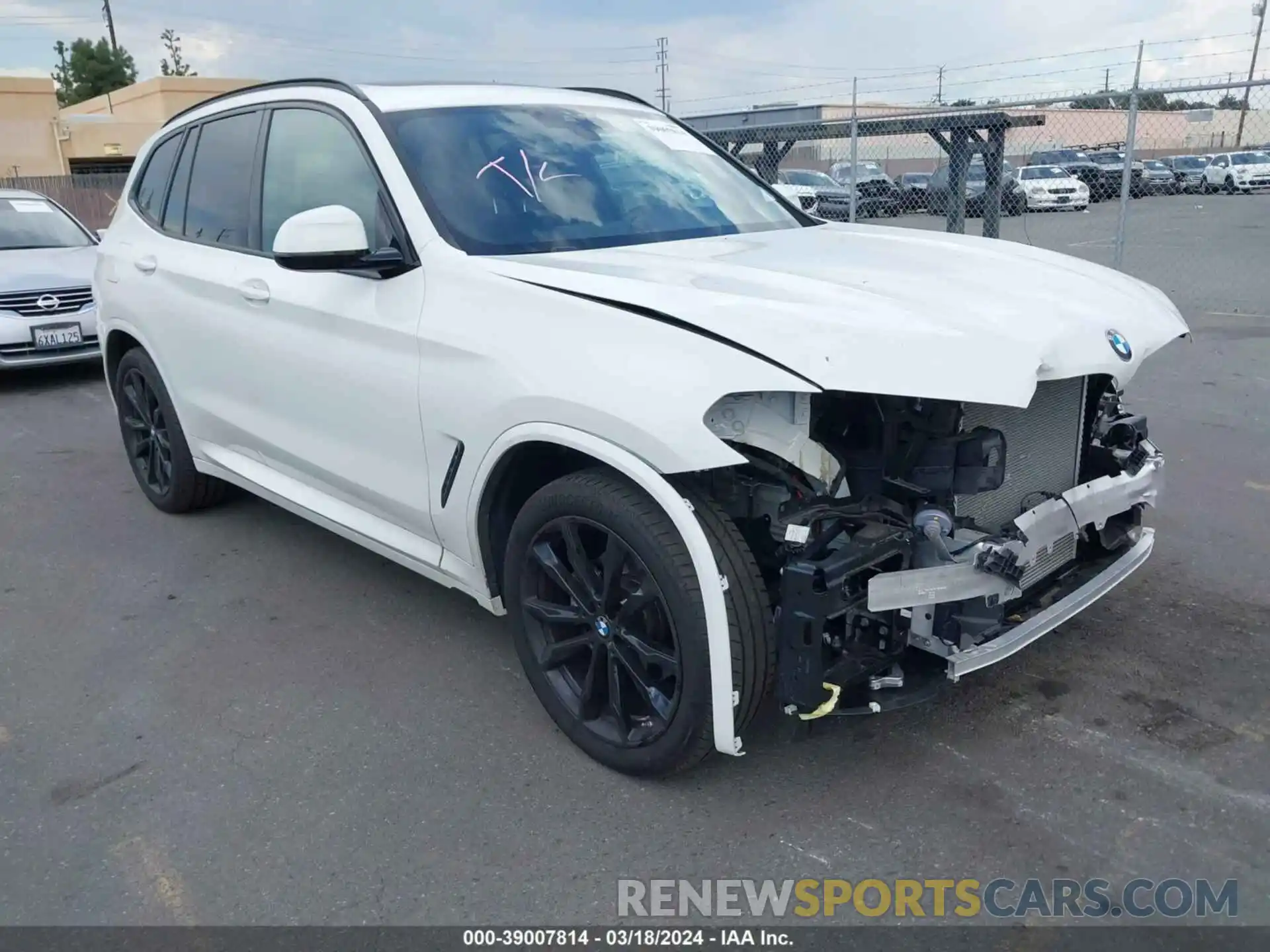 1 Photograph of a damaged car 5UX43DP01P9R72636 BMW X3 2023