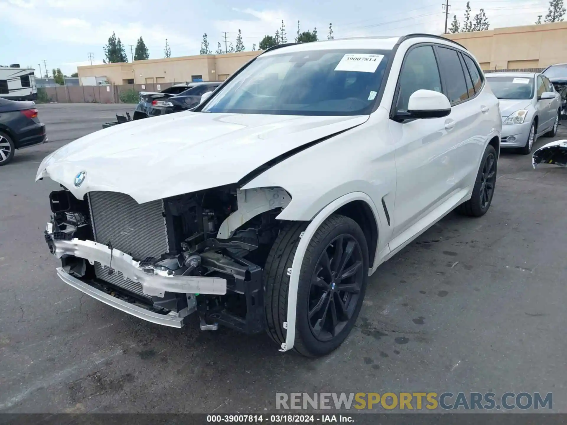 2 Photograph of a damaged car 5UX43DP01P9R72636 BMW X3 2023