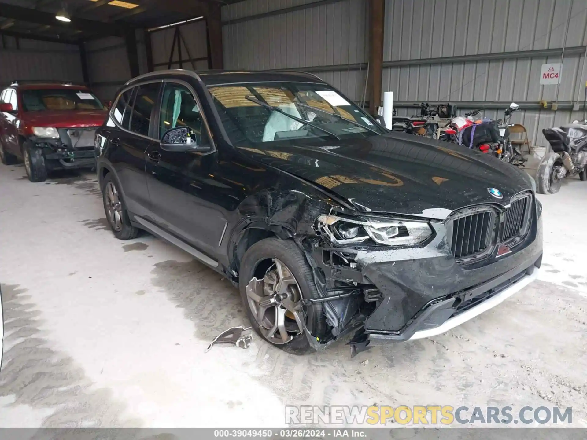 1 Photograph of a damaged car 5UX43DP02P9R45669 BMW X3 2023