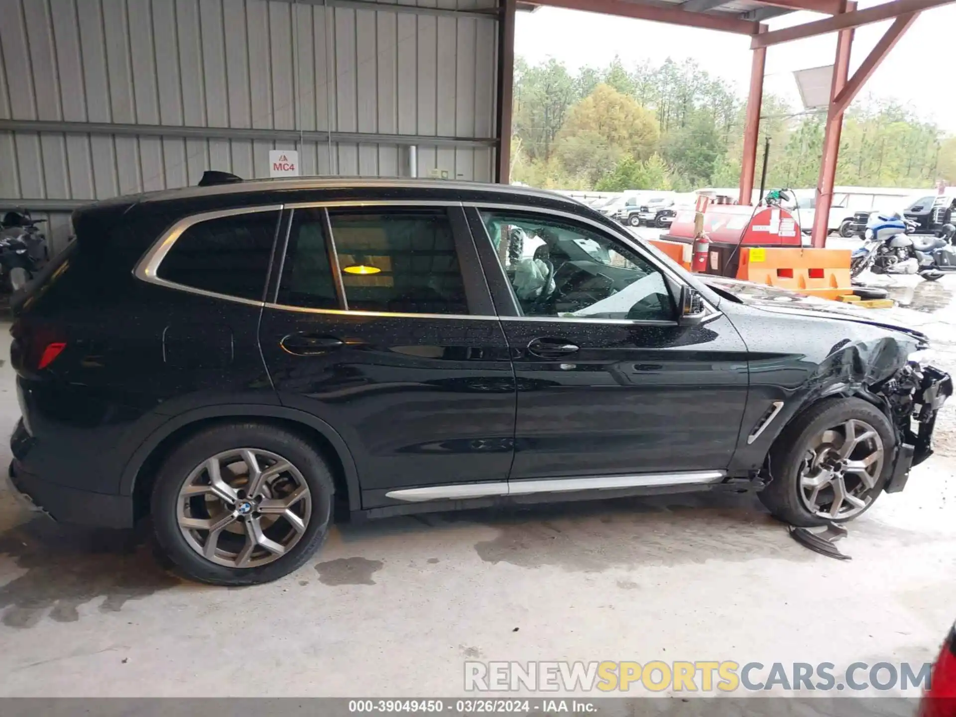 12 Photograph of a damaged car 5UX43DP02P9R45669 BMW X3 2023