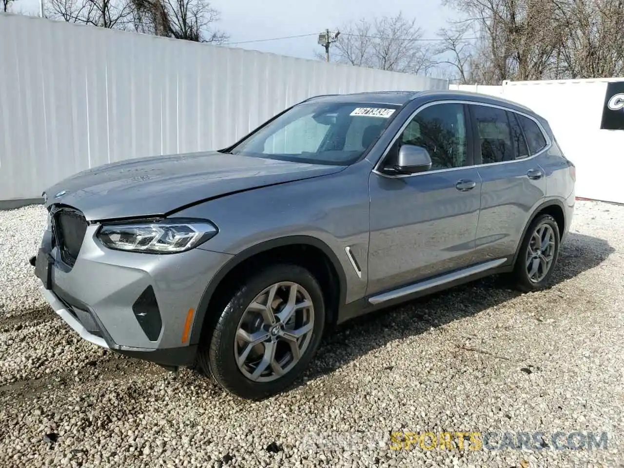 1 Photograph of a damaged car 5UX53DP02R9V05894 BMW X3 2024