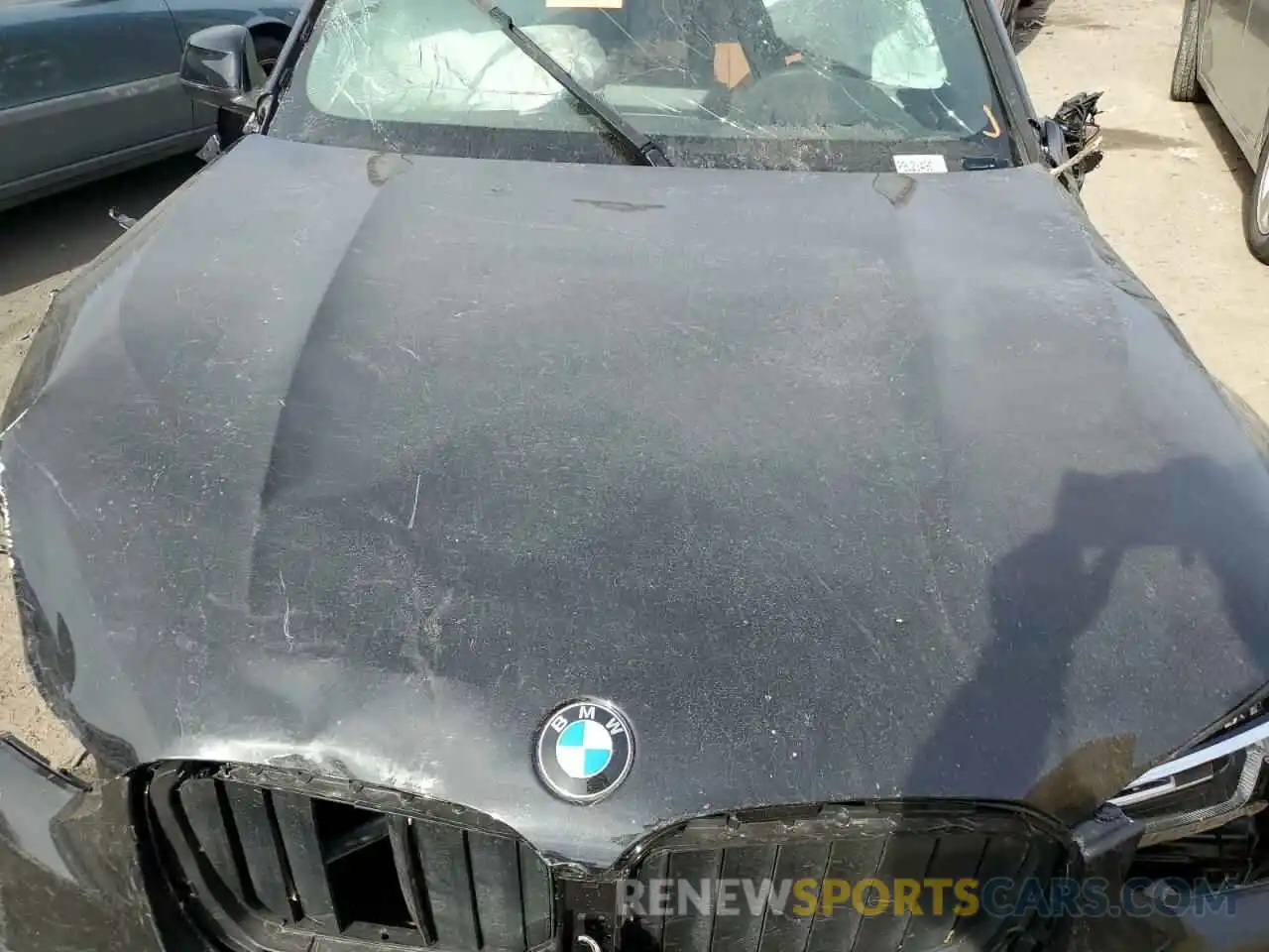 12 Photograph of a damaged car 5UX53DP07R9U23496 BMW X3 2024