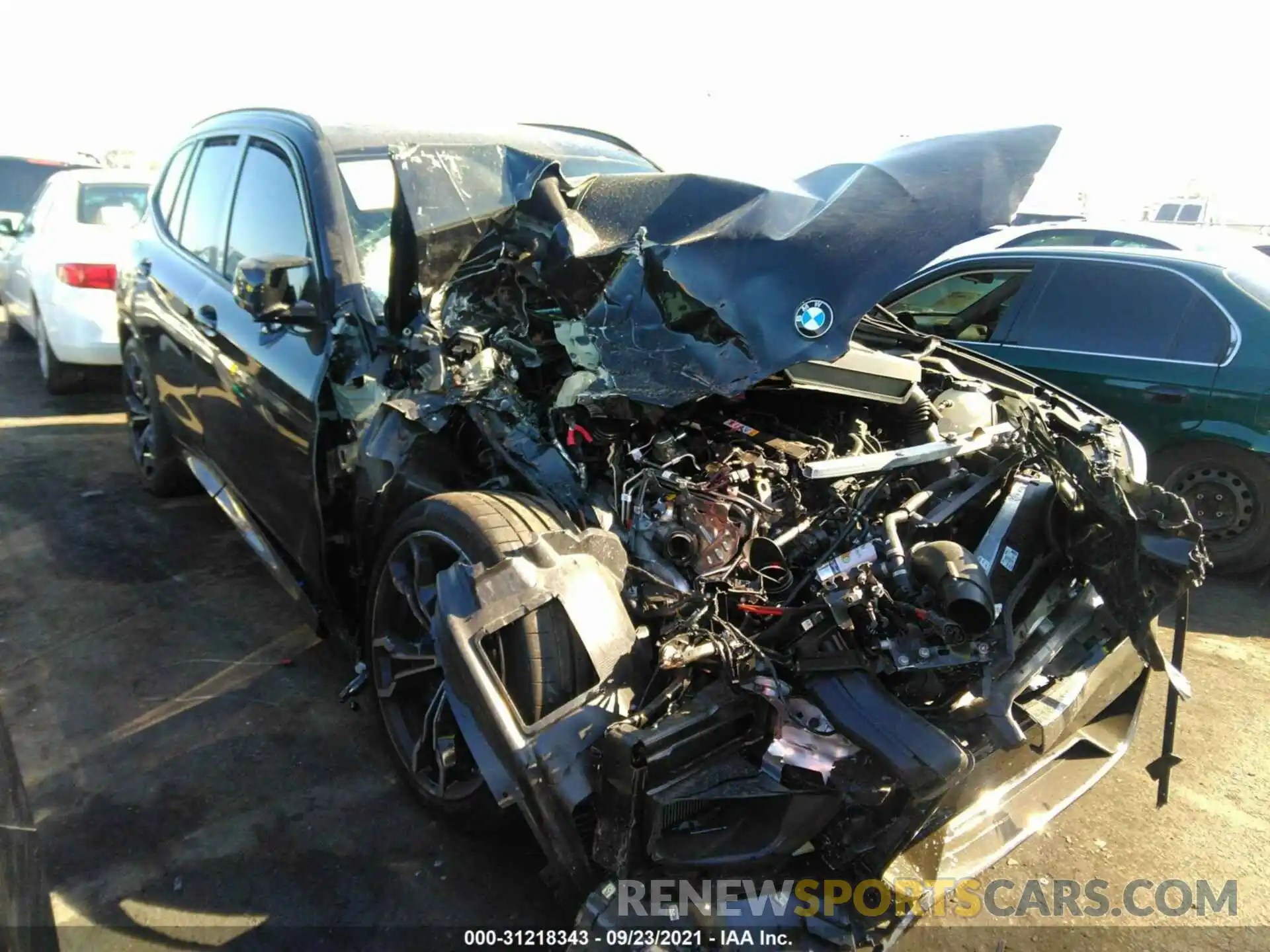 1 Photograph of a damaged car 5YMTS0C00M9H69628 BMW X3 M 2021