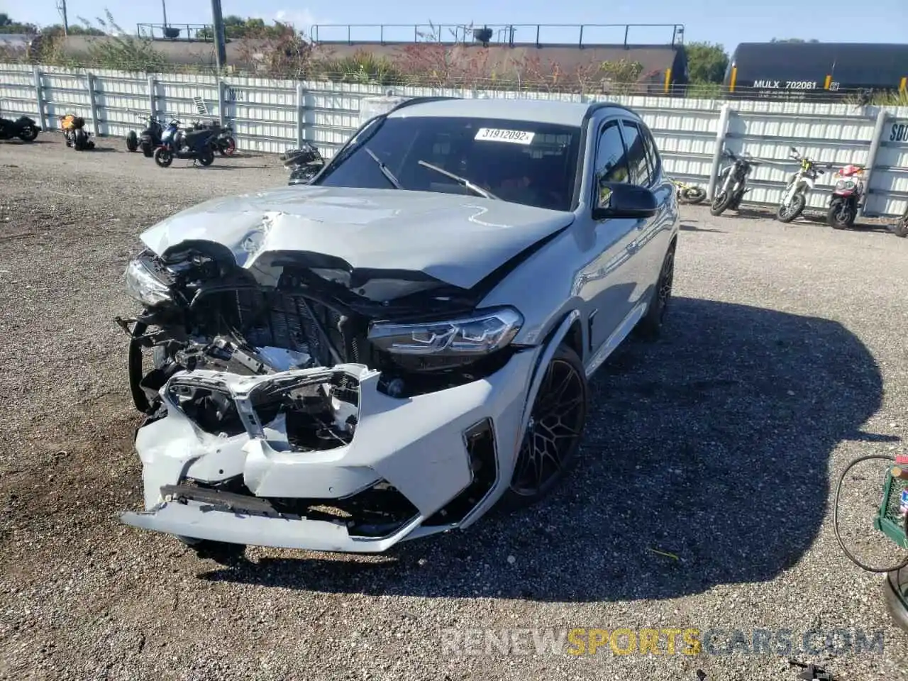 2 Photograph of a damaged car 5YM13EC04N9J53799 BMW X3 M 2022