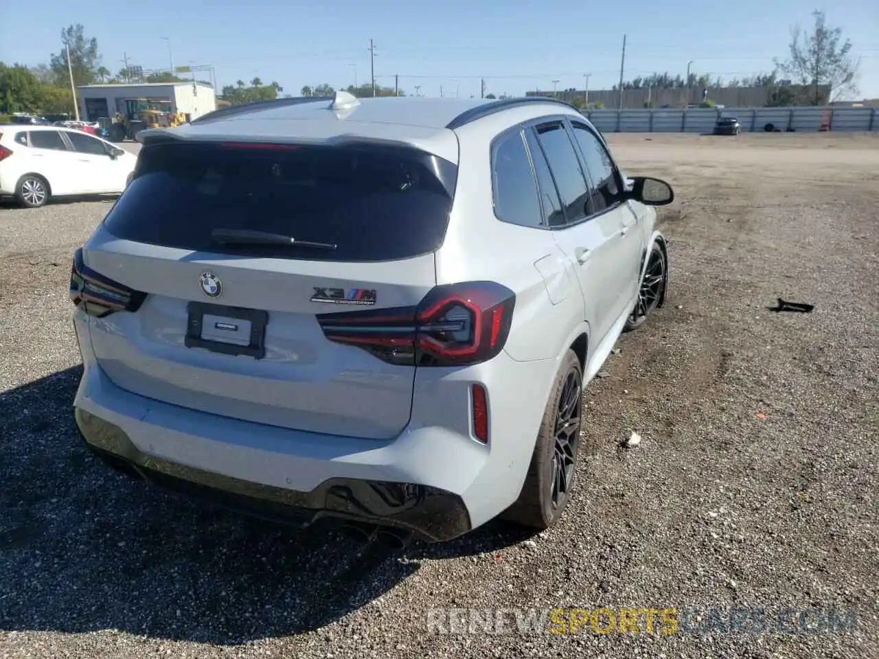 4 Photograph of a damaged car 5YM13EC04N9J53799 BMW X3 M 2022