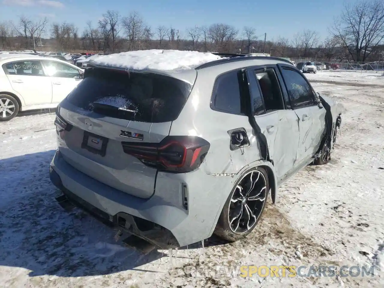 4 Photograph of a damaged car 5YM13EC06N9J41816 BMW X3 M 2022