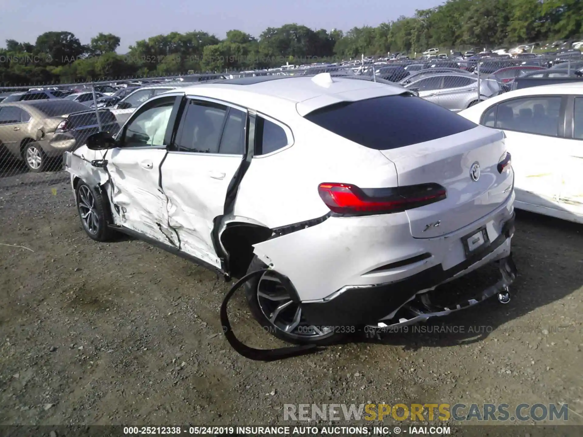 3 Photograph of a damaged car 5UXUJ3C53KLG52945 BMW X4 2019