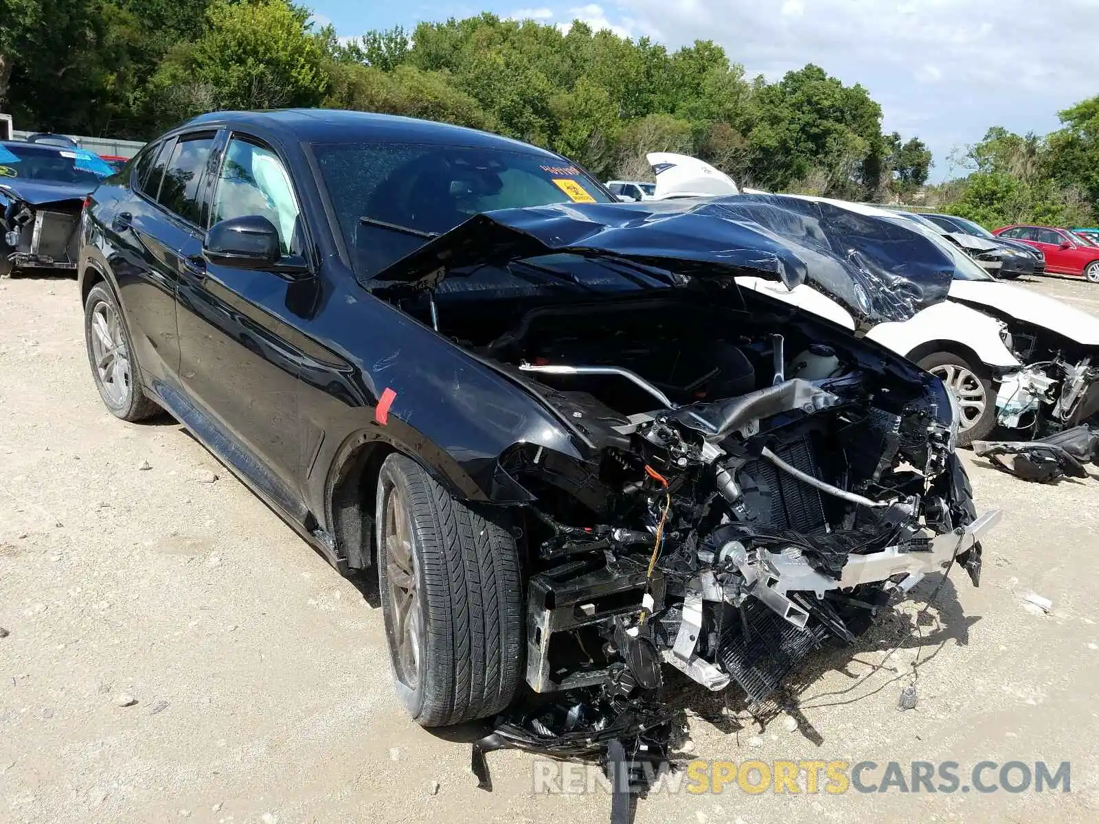 1 Photograph of a damaged car 5UXUJ3C5XKLG56734 BMW X4 2019