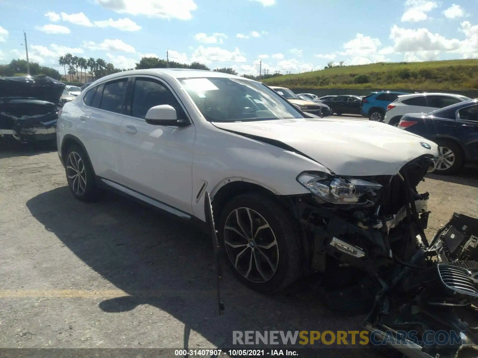 1 Photograph of a damaged car 5UXUJ3C5XKLG56748 BMW X4 2019