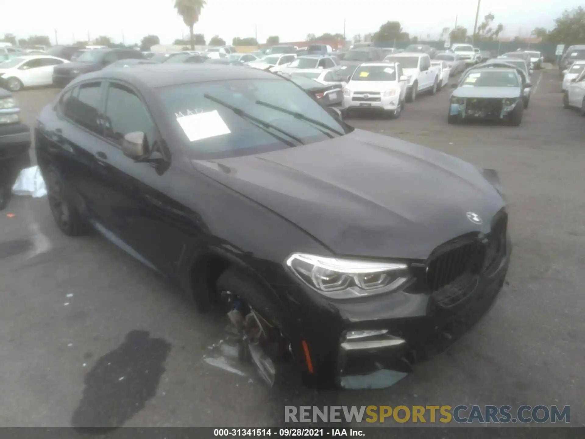 1 Photograph of a damaged car 5UXUJ5C50KLJ62973 BMW X4 2019