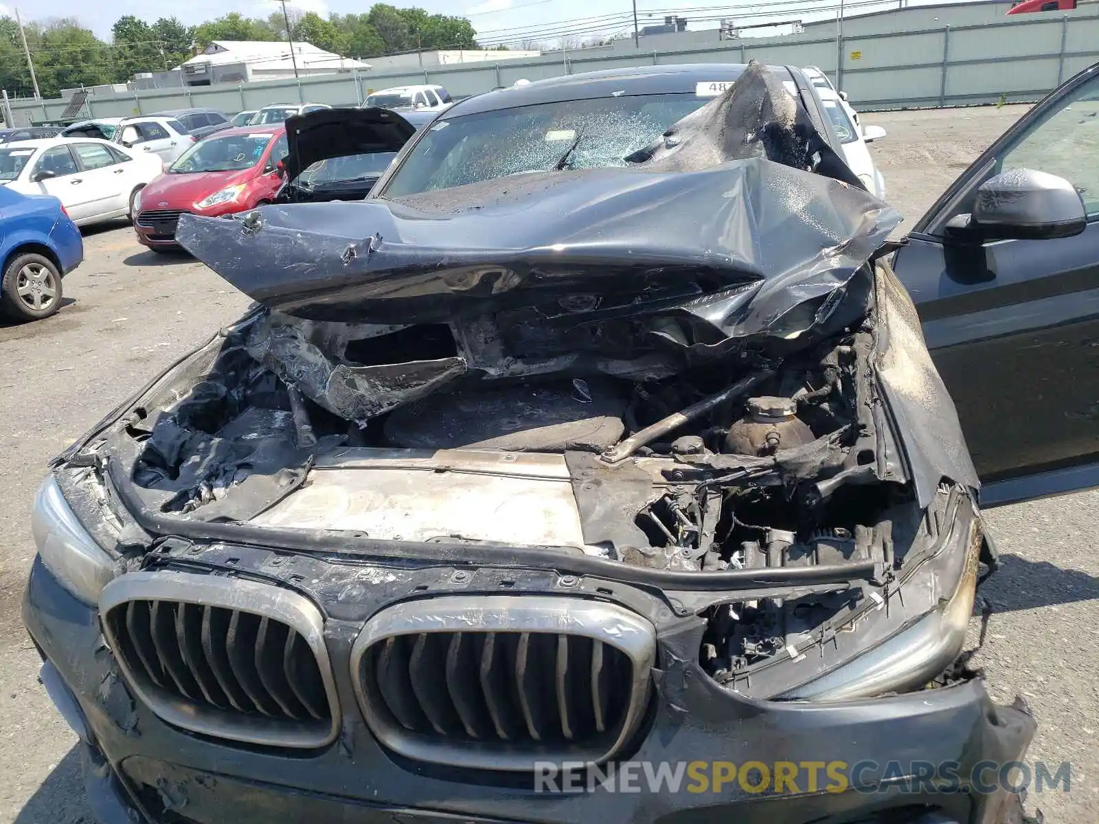 7 Photograph of a damaged car 5UXUJ5C5XKLA93440 BMW X4 2019