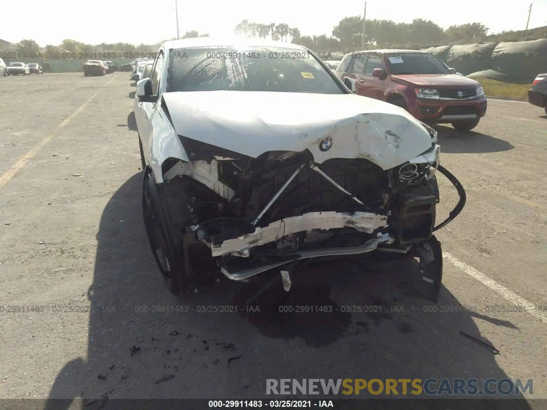 6 Photograph of a damaged car 5UX2V1C04L9B17643 BMW X4 2020